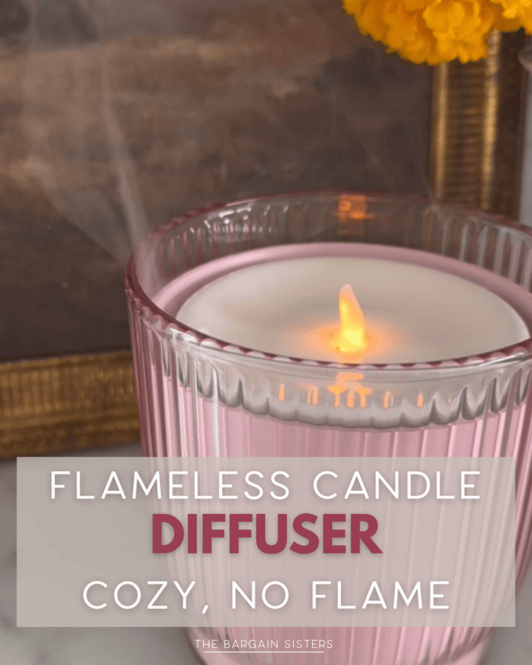 A pink ribbed flameless candle diffuser emits a soft glow and vapor, with yellow flowers in the background. Text on the image reads: “Flameless Candle Diffuser. Cozy, No Flame.”.