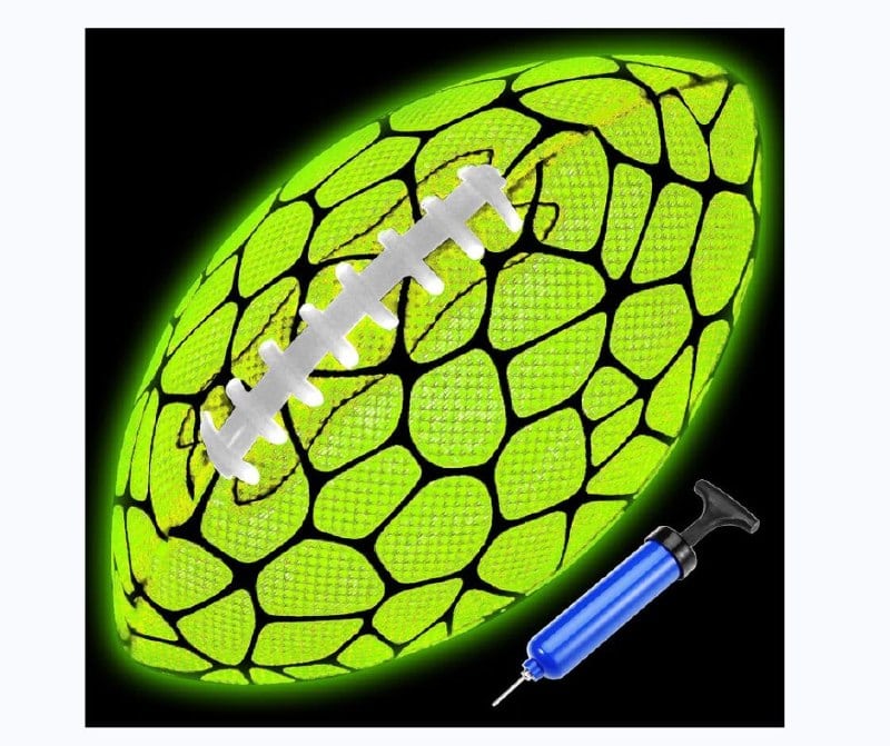 A glow in the dark LED football lit up for nighttime backyard play, featured in our Friday Deals.