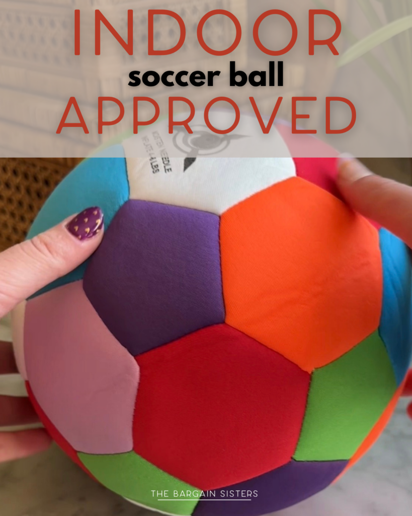 A person holds a colorful, soft soccer ball indoors. Bold text over the image reads “INDOOR soccer ball APPROVED.”.