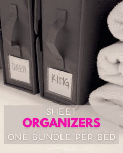 Two labeled black bins for organizing bed sheets, marked “QUEEN” and “KING,” sit beside neatly folded towels. Text overlay reads: “SHEET ORGANIZERS, ONE BUNDLE PER BED, THE BARGAIN SISTERS.”.