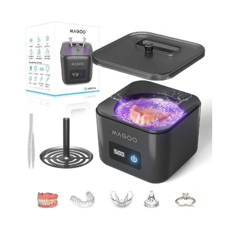 A compact ultrasonic cleaner machine for retainers, aligners and dentures sitting on a bathroom counter, featured in our Friday Deals.