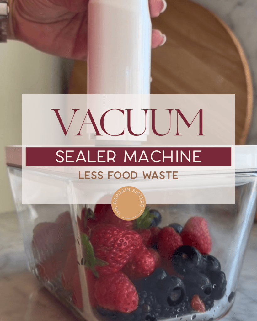 A hand uses a vacuum sealer machine on a container filled with strawberries, raspberries, and blueberries. Text on image promotes reducing food waste with the vacuum sealer machine.