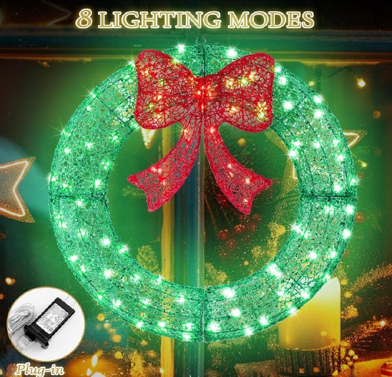 A 24 inch pre-lit artificial Christmas wreath with warm white lights, featured in our Wednesday Deals.