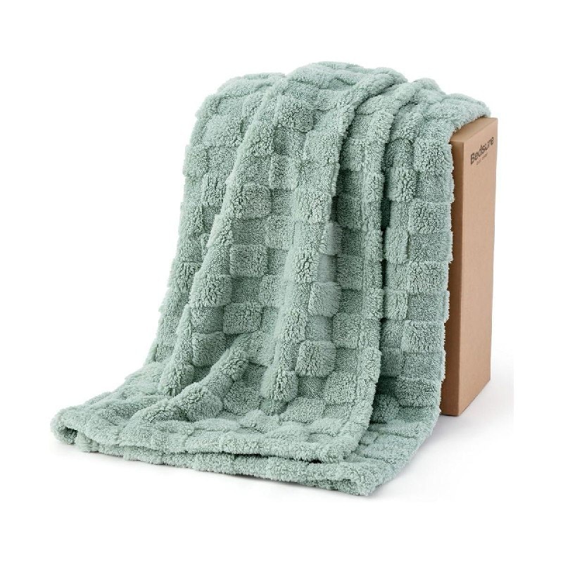 A soft checkered throw blanket folded neatly for cozy fall evenings, featured in our Thursday Deals.