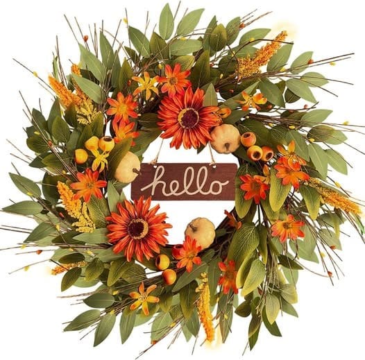 A full fall wreath with autumn leaves and seasonal accents for a front door, featured in our Friday Deals.