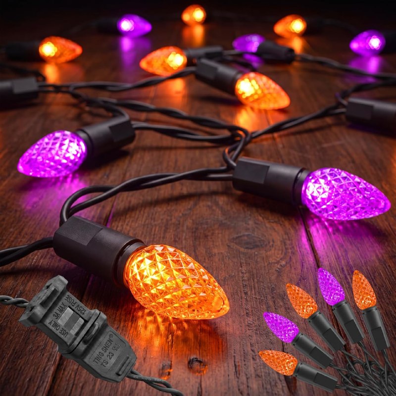 A strand of orange and purple Halloween string lights glowing against a dark backdrop, featured in our Wednesday Deals.