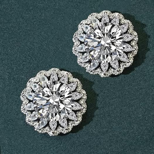 A pair of sparkling moissanite sunflower stud earrings in a sterling silver setting featured in our Wednesday Deals.