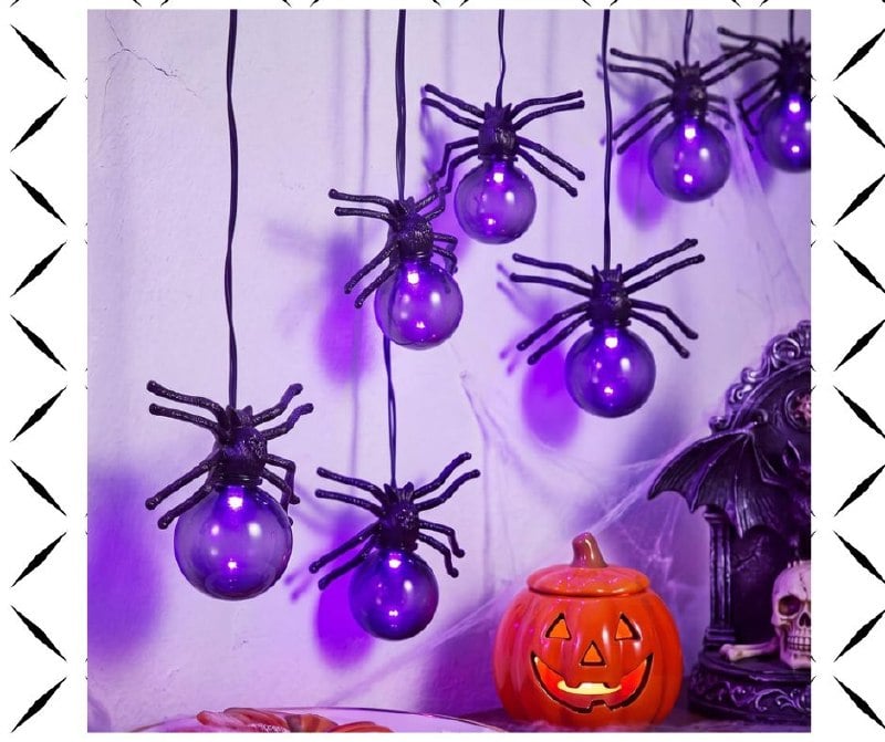 A strand of glowing purple spider string lights draped as spooky Halloween decor, featured in our Monday Deals.