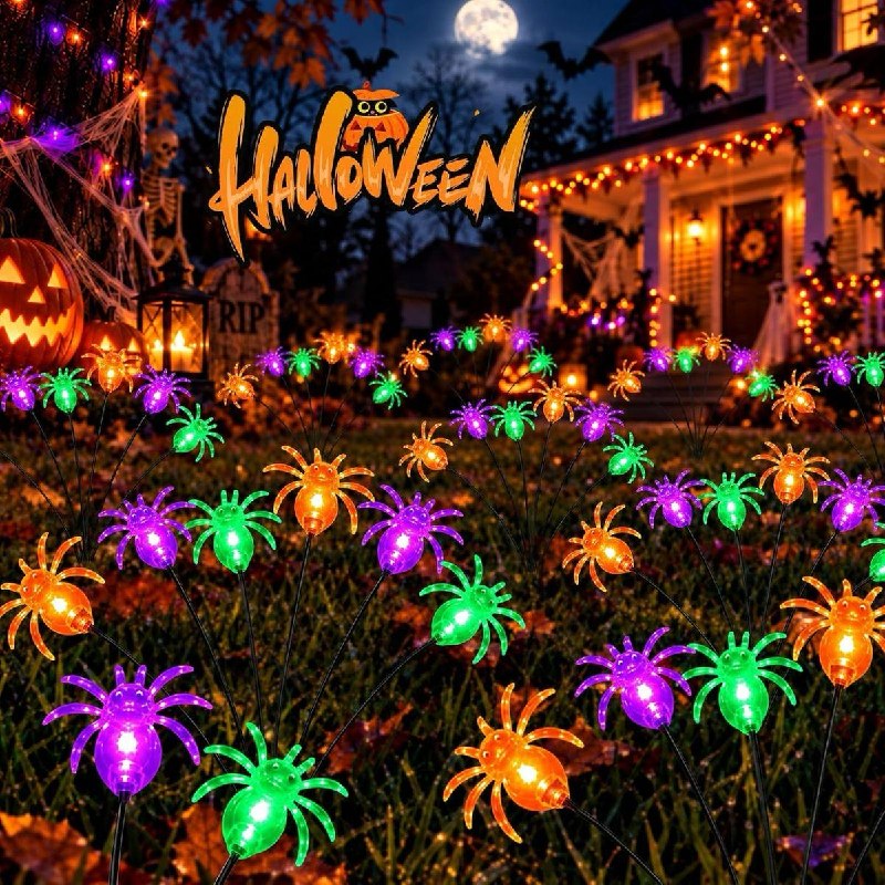 Solar-powered spider firefly string lights glowing in a yard at night featured in our Tuesday Deals.